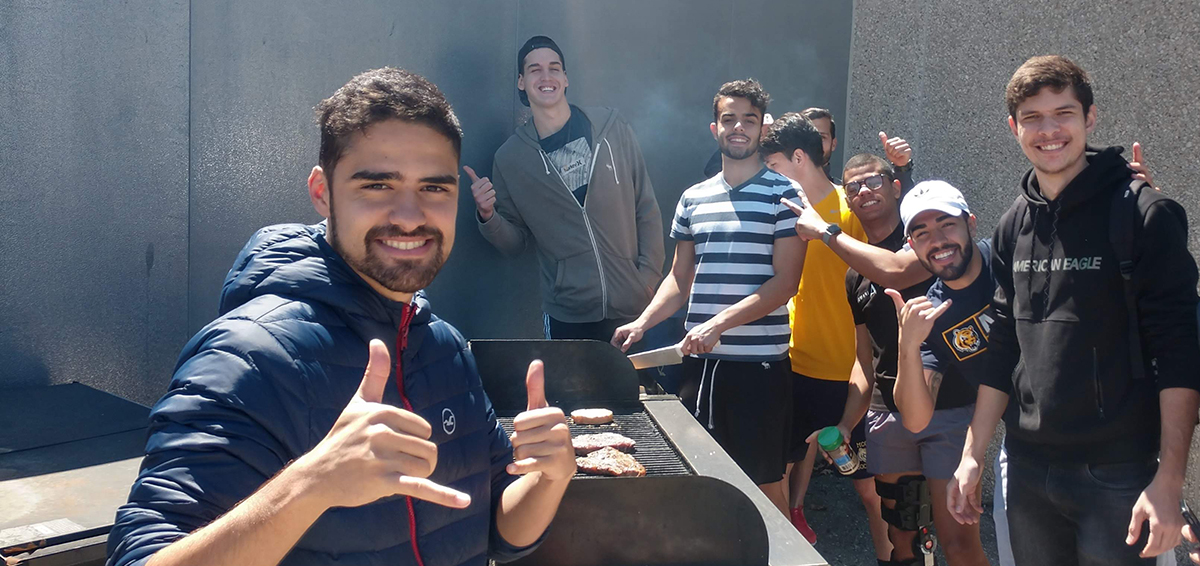 International students around BBQ